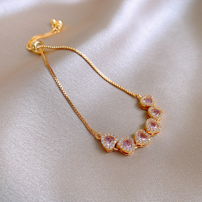 Six heart-shaped bracelets