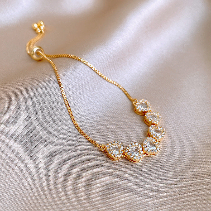 Six heart-shaped bracelets