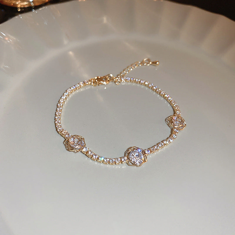 Three metal flower zircon bracelet